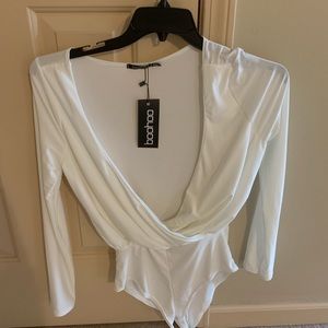 Gorgeous long sleeved body suit . WORN ONCE!!